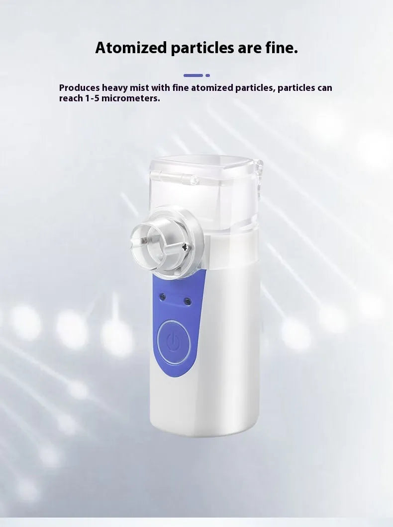 White columnar plastic USB handheld nebuliser spray machine with water tank on a table.