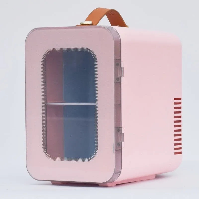 Pink mini refrigerator with transparent door showing 6L capacity for car and home hot and cold use