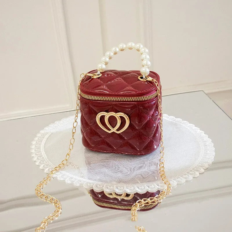 PVC bucket gel handbag with heart pattern in multiple colour options including apricot, black, green, orange, red, white and yellow