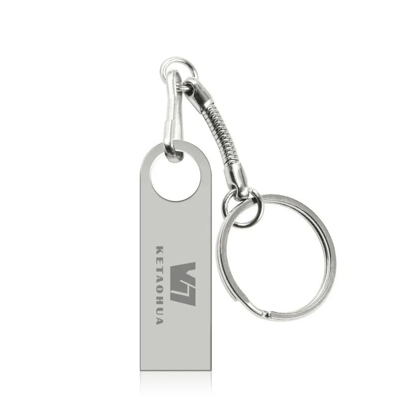Slim silver metal USB flash drive on a dark background showing its compact 39mm length and 4.5mm thickness.