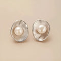 Geometric sterling silver ear studs with pearl elements and electroplated gold finish