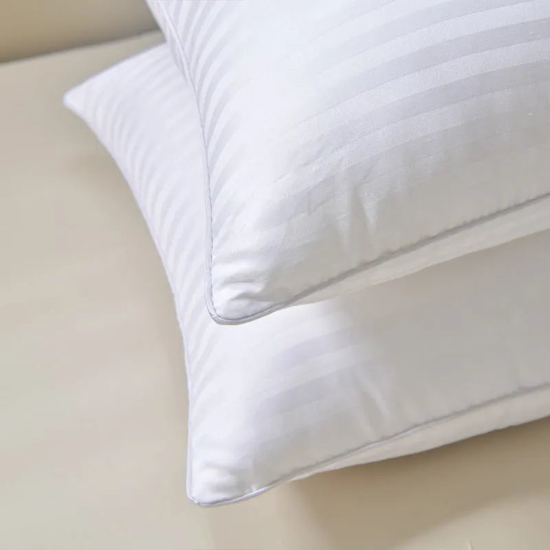 White hotel cotton satin stripe pillow with feather and cotton filling shown in three size options.