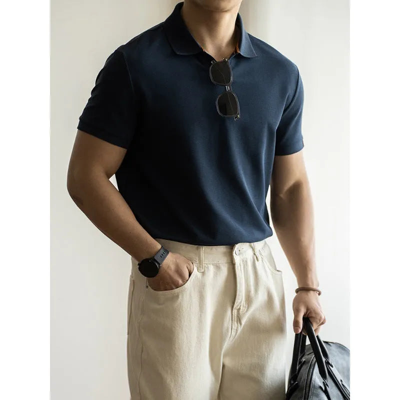 Blue short-sleeved casual polo shirt on a hanger showing the collar and button placket.
