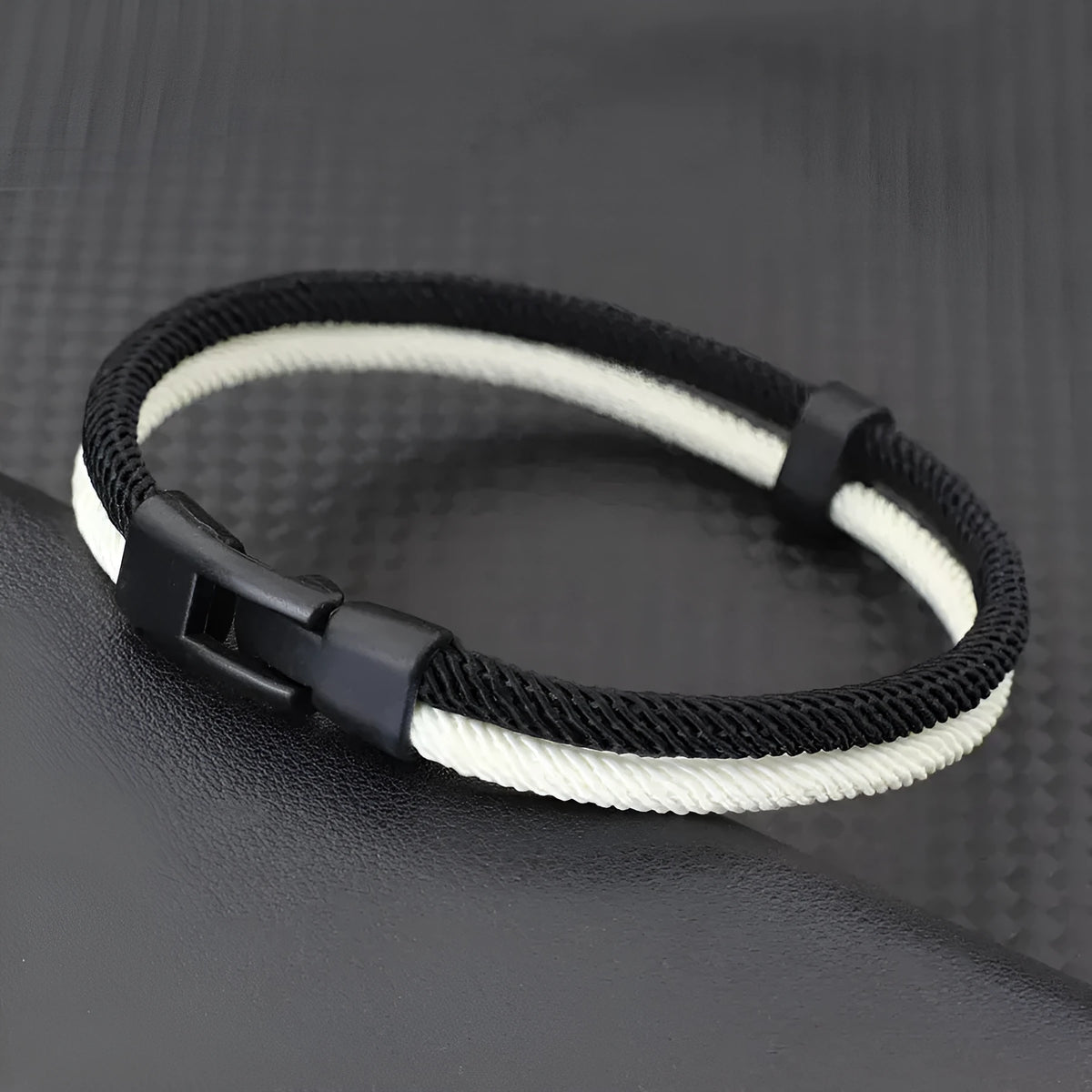 Black and white handmade woven hand strap with Milan rope alloy construction
