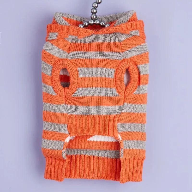 Orange striped hooded pet sweater with knitted acrylic construction and fur ball detail