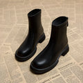 Women's thick heel flat ankle boots with back zip in black or brown colours