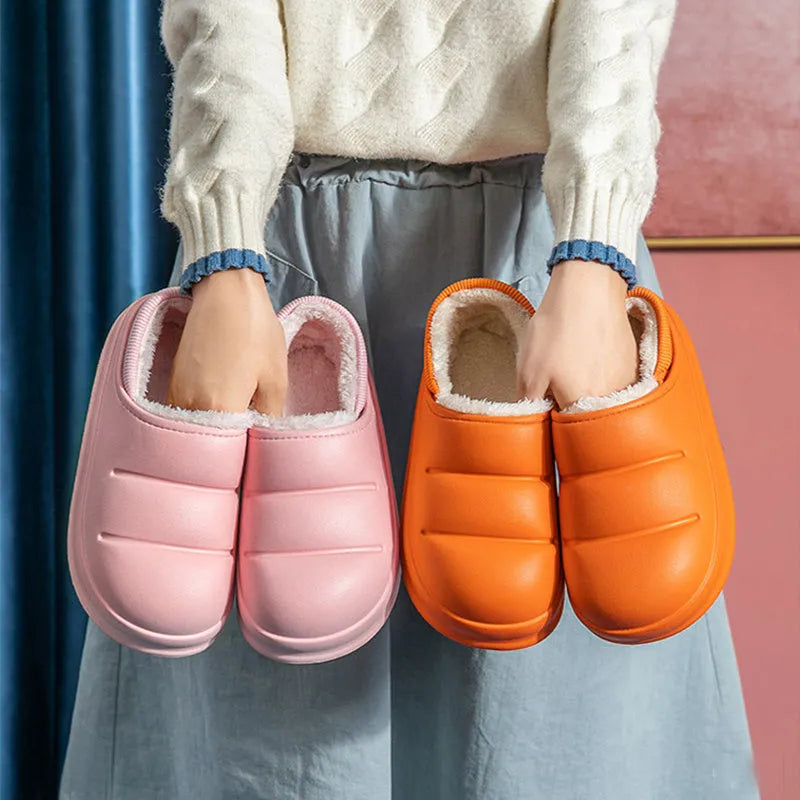 Waterproof EVA garden slippers in green with a plush lining and non-slip sole.