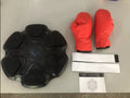 Smart electronic boxing wall target with scoring display and focus gloves for home training.