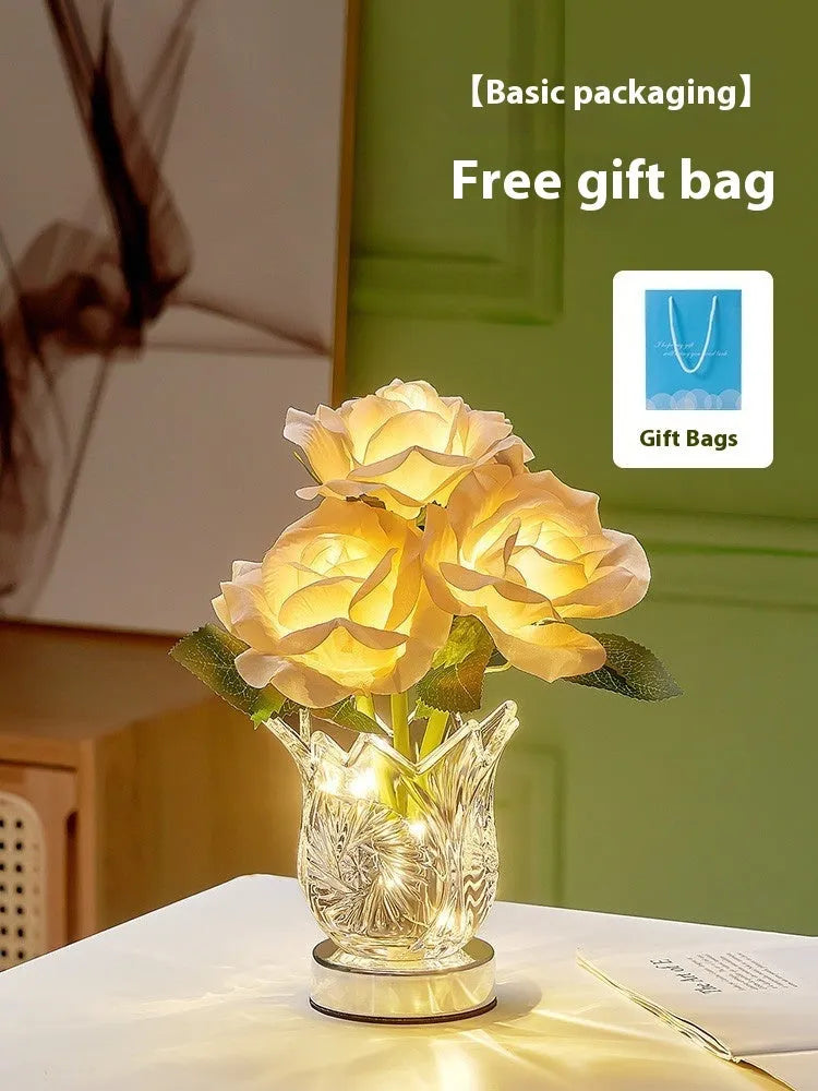 Modern clear crystal flowers USB rechargeable table lamp with touch dimming control on a wooden surface.